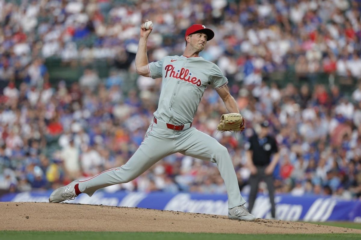 Jul 2, 2024; Chicago, Illinois, USA; Philadelphia Phillies starting pitcher Michael Mercado (63) delivers a pitch against the Chicago Cubs during the first inning at Wrigley Field. Mandatory Credit: Kamil Krzaczynski-USA TODAY Sports