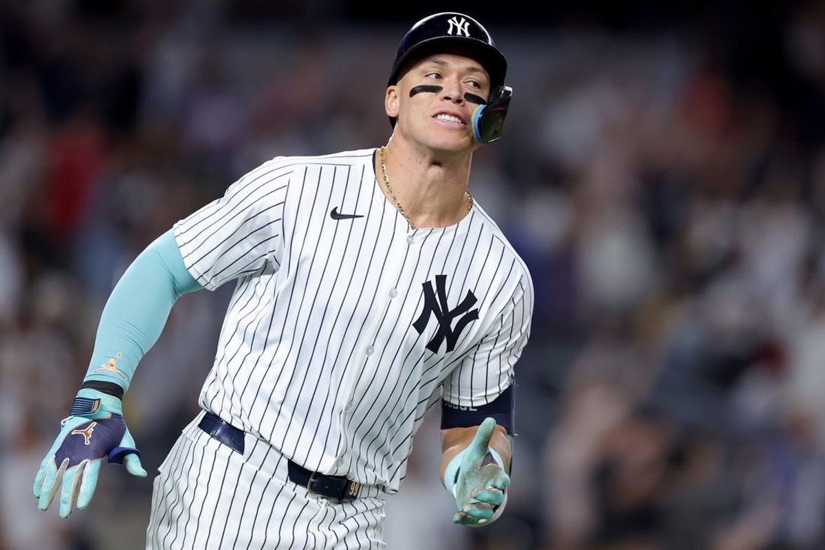 Jul 2, 2024; Bronx, New York, USA; New York Yankees designated hitter Aaron Judge (99) rounds the bases after hitting a solo home run against the Cincinnati Reds during the seventh inning at Yankee Stadium. Mandatory Credit: Brad Penner-USA TODAY Sports