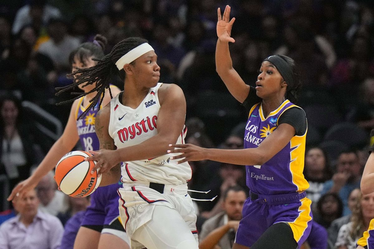 Jul 2, 2024; Los Angeles, California, USA; Washington Mystics forward Myisha Hines-Allen (left) is defended by LA Sparks forward Rickea Jackson (right) in the first half at Crypto.com Arena. Mandatory Credit: Kirby Lee-USA TODAY Sports