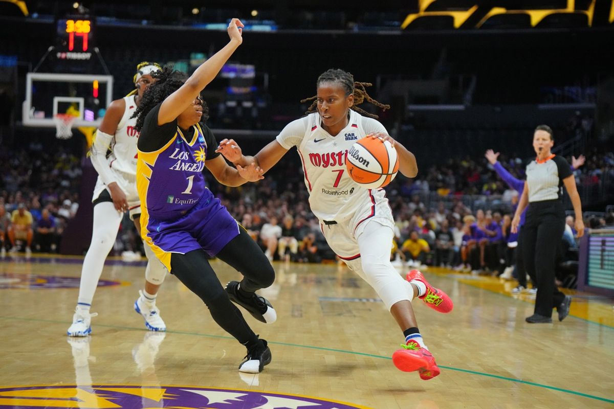 Jul 2, 2024; Los Angeles, California, USA; Washington Mystics guard Ariel Atkins (7) dribbles the ball against LA Sparks guard Zia Cooke (1) in the second half at Crypto.com Arena. Mandatory Credit: Kirby Lee-Imagn Images