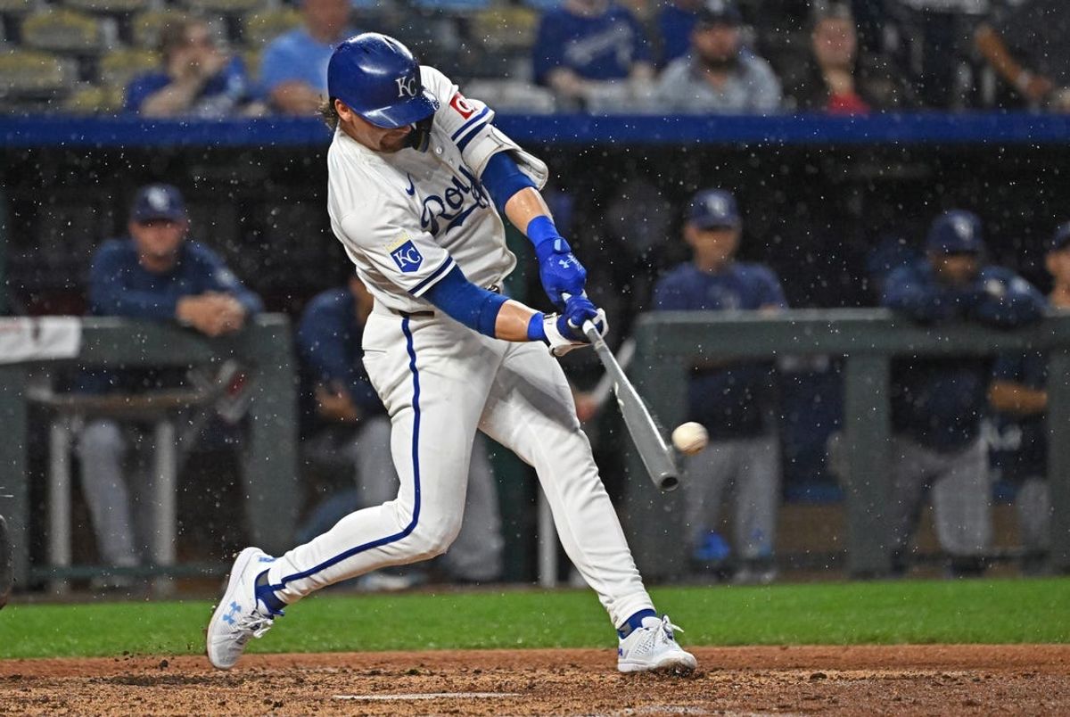 Jul 2, 2024; Kansas City, Missouri, USA; Kansas City Royals shortstop Bobby Witt Jr. (7) hits a solo home run in the sixth inning against the Tampa Bay Rays at Kauffman Stadium. Mandatory Credit: Peter Aiken-USA TODAY Sports