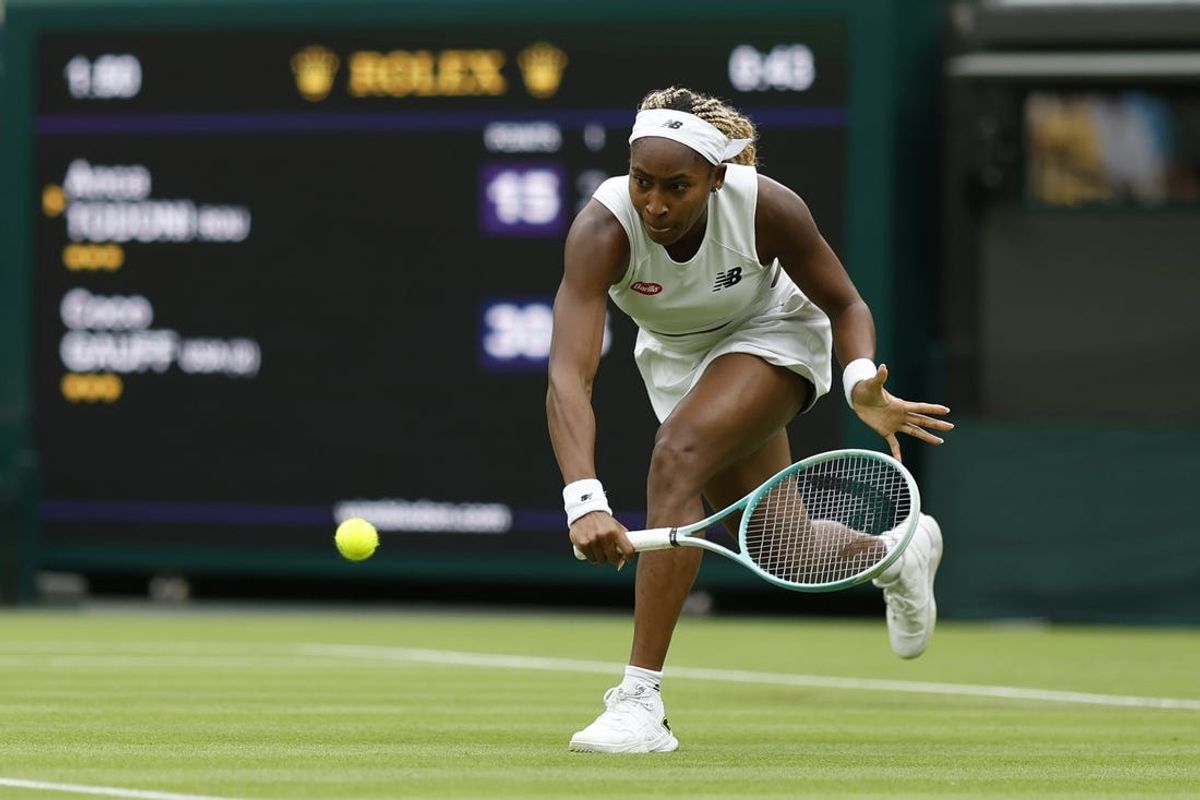 Jul 3, 2024; London, United Kingdom; Coco Gauff (USA) reaches for a backhand against Anca Todoni (ROU)(not pictured) in a ladies'' singles match on day three of The Championships Wimbledon 2024 at All England Lawn Tennis and Croquet Club. Mandatory Credit: Geoff Burke-USA TODAY Sports