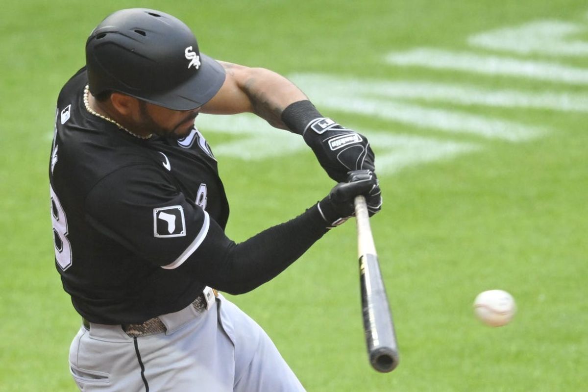 Jul 3, 2024; Cleveland, Ohio, USA; Chicago White Sox right fielder Tommy Pham (28) singles in the fourth inning against the Cleveland Guardians at Progressive Field. Mandatory Credit: David Richard-USA TODAY Sports
