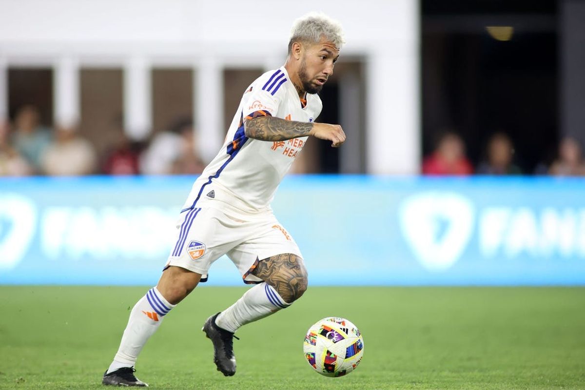 Jul 3, 2024; Washington, District of Columbia, USA; FC Cincinnati midfielder Luciano Acosta (10) kicks the all against D.C. United during the first half at Audi Field. Mandatory Credit: Daniel Kucin Jr.-USA TODAY Sports