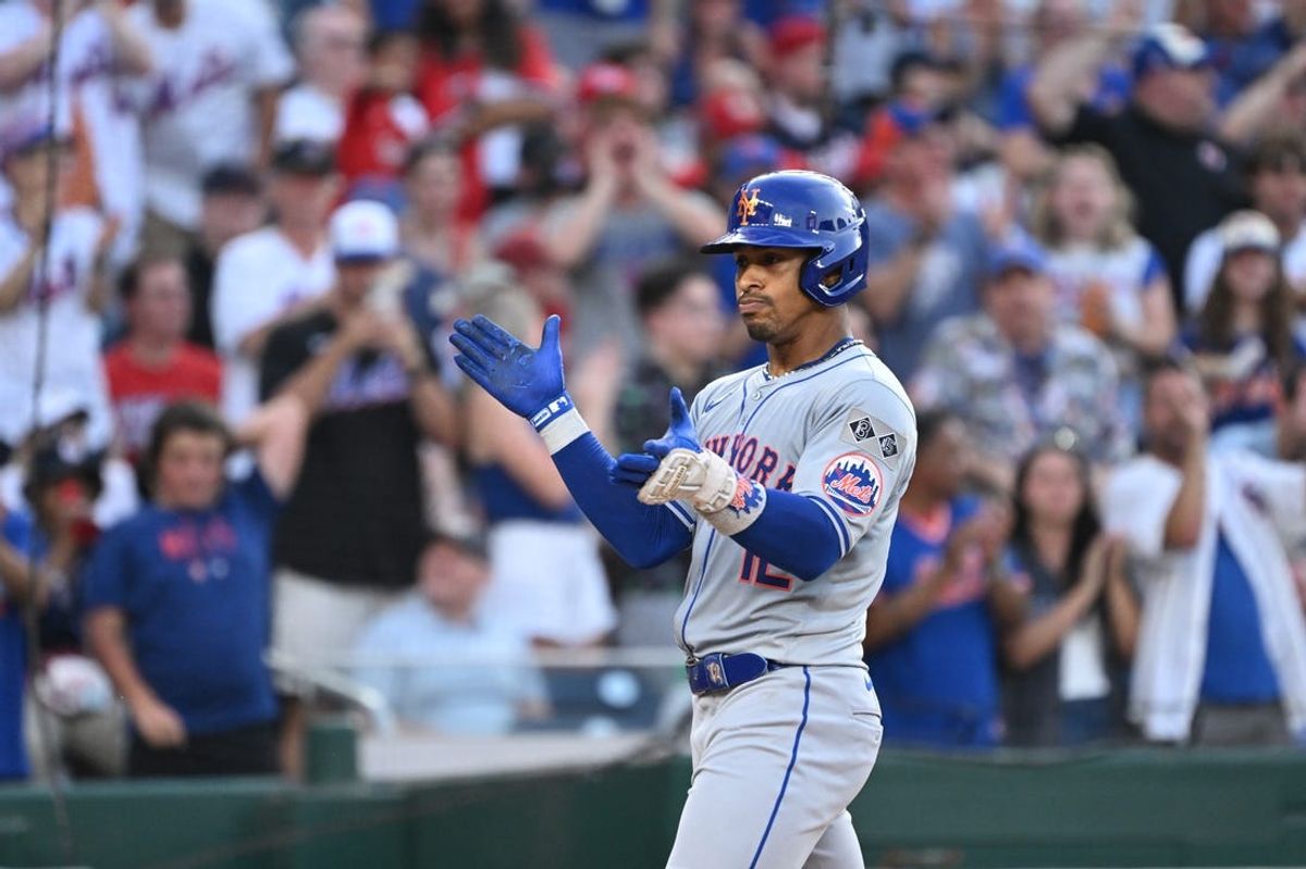 Jul 3, 2024; Washington, District of Columbia, USA; New York Mets shortstop Francisco Lindor (12) celebrates after hitting a two run home run against the Washington Nationals during the fifth inning at Nationals Park. Mandatory Credit: Rafael Suanes-USA TODAY Sports