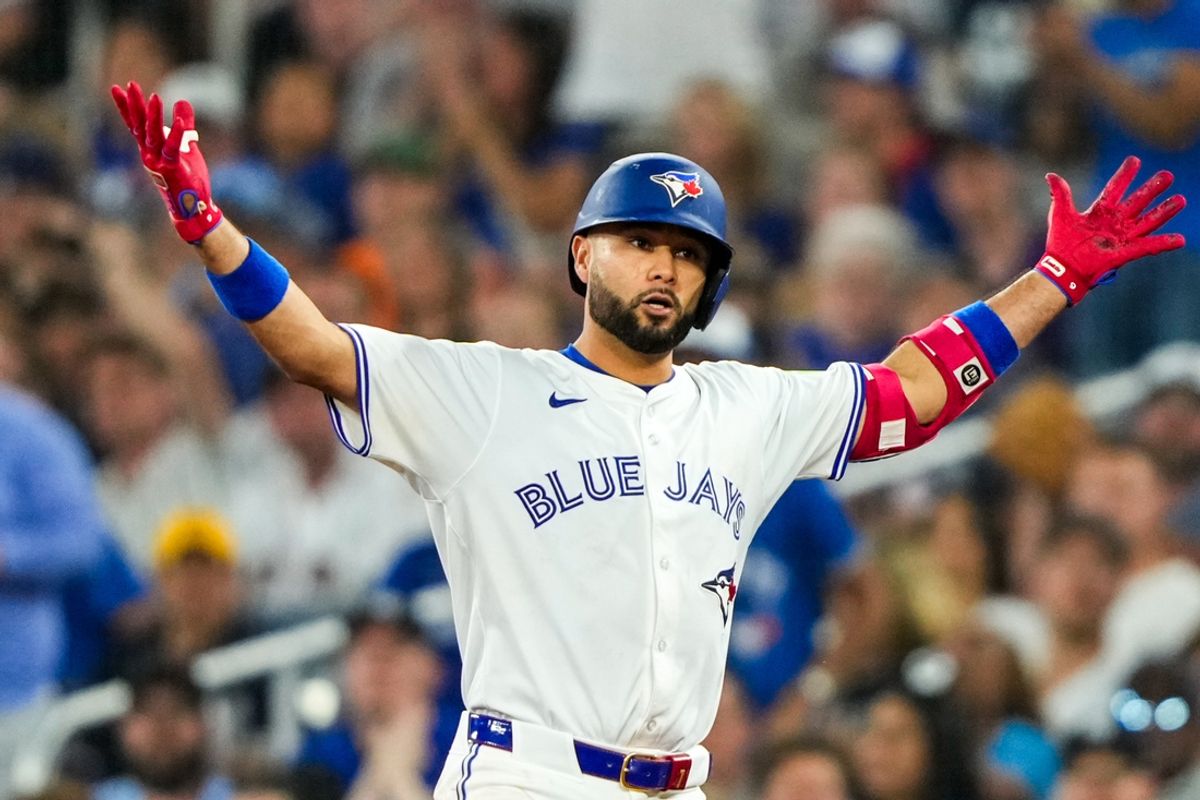 Jun 29, 2024; Toronto, Ontario, CAN; Toronto Blue Jays third base Isiah Kiner-Falefa (7) celebrates after hitting a single against the New York Yankees at Rogers Centre. Mandatory Credit: Kevin Sousa-USA TODAY Sports