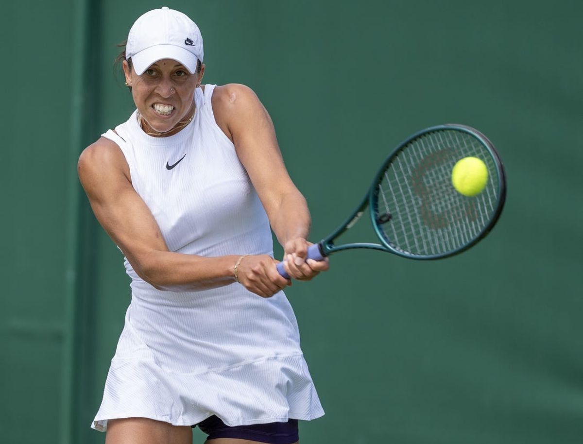 Jul 4, 2024; London, United Kingdom; Madison Keys of the United States returns a shot during her match against Yafan Wang of China (not shown) on day four of The Championships at All England Lawn Tennis and Croquet Club. Mandatory Credit: Susan Mullane-USA TODAY Sports
