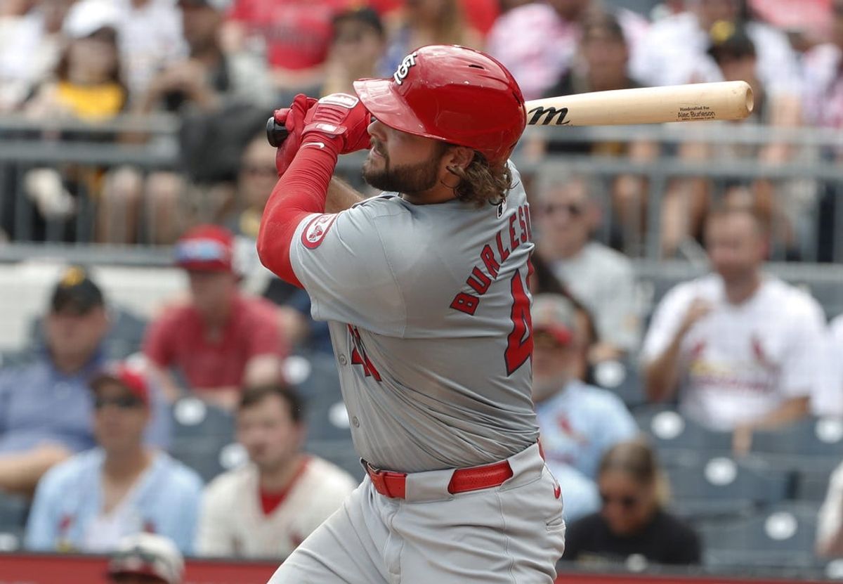 Jul 4, 2024; Pittsburgh, Pennsylvania, USA; St. Louis Cardinals right fielder Alec Burleson (41) hits a single against the Pittsburgh Pirates during the sixth inning at PNC Park. Mandatory Credit: Charles LeClaire-USA TODAY Sports
