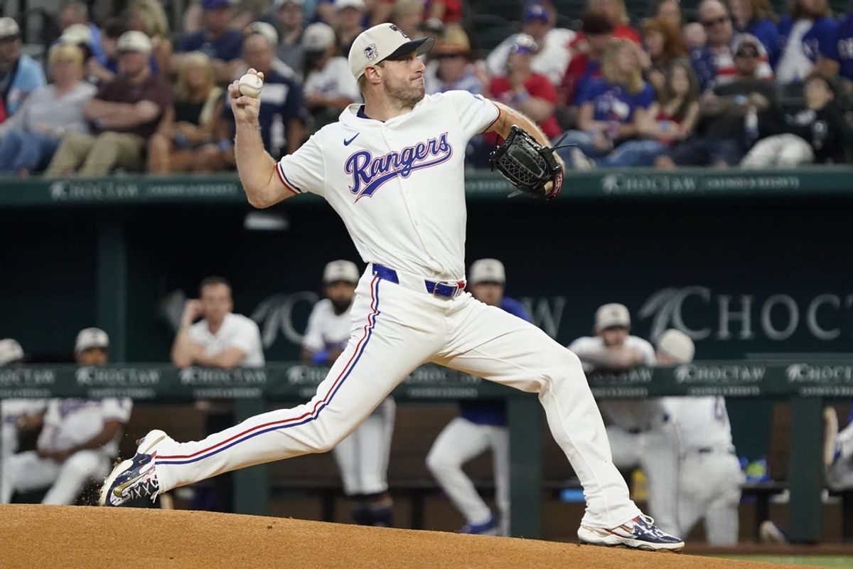 Jul 4, 2024; Arlington, Texas, USA;   Texas Rangers pitcher Max Scherzer (31) throws to the plate during the first inning against the San Diego Padres at Globe Life Field. Mandatory Credit: Raymond Carlin III-USA TODAY Sports