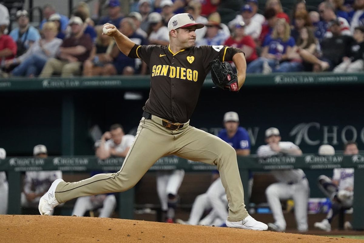 Jul 4, 2024; Arlington, Texas, USA; San Diego Padres pitcher Michael King (34) throws to the plate during the first inning against the Texas Rangers at Globe Life Field. Mandatory Credit: Raymond Carlin III-USA TODAY Sports