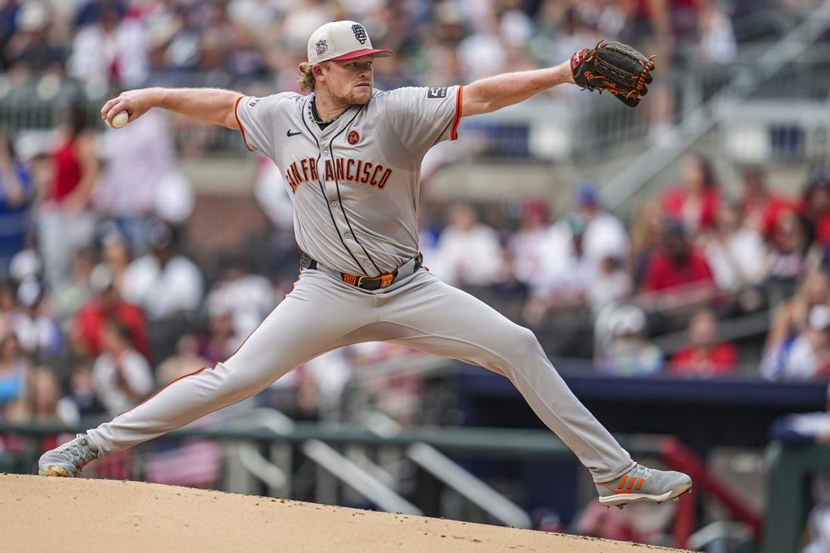 Jul 4, 2024; Cumberland, Georgia, USA; San Francisco Giants pitcher Logan Webb (62) pitches against the Atlanta Braves during the first inning at Truist Park. Mandatory Credit: Dale Zanine-USA TODAY Sports
