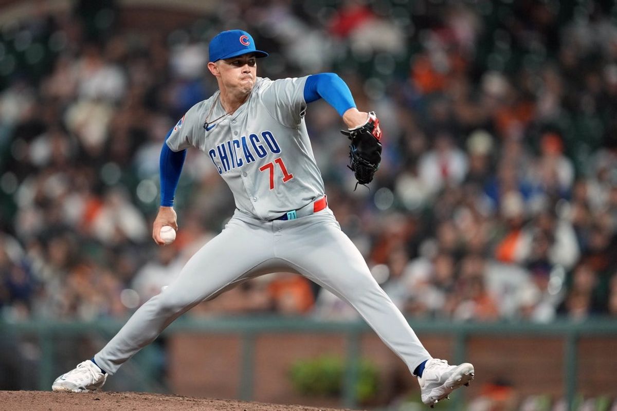 Jun 26, 2024; San Francisco, California, USA; Chicago Cubs relief pitcher Keegan Thompson (71) throws a pitch against the San Francisco Giants during the eighth inning at Oracle Park. Mandatory Credit: Darren Yamashita-Imagn Images