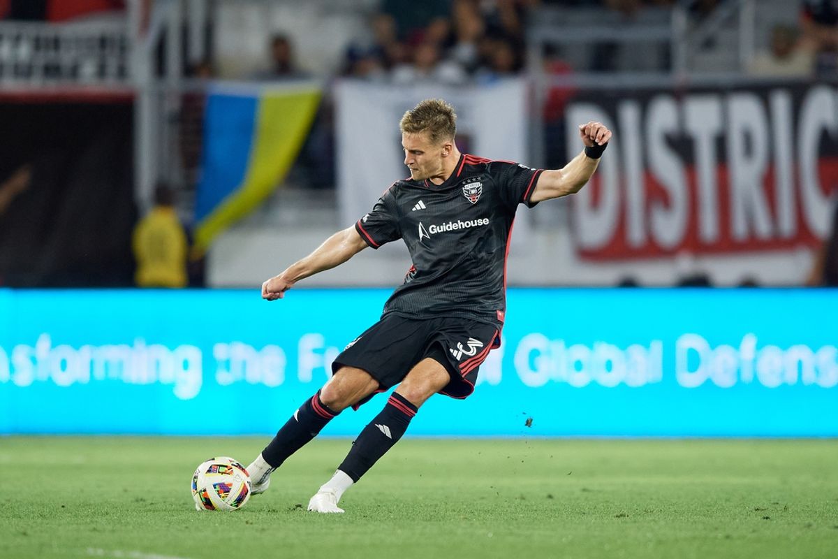 Jul 3, 2024; Washington, District of Columbia, USA; D.C. United defender Lucas Bartlett (3) passes the ball against the FC Cincinnati during the second half at Audi Field. Mandatory Credit: Hannah Foslien-USA TODAY Sports