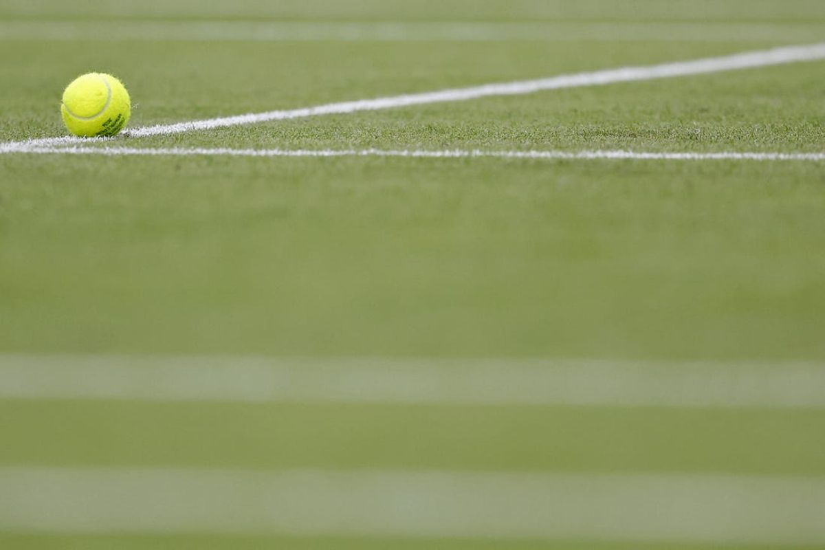 Jul 5, 2024; London, United Kingdom; A match ball rests on the court after the match between Sonay Kartal (GBR) and Coco Gauff (USA)(both not pictured) in ladies' singles on day five of The Championships Wimbledon 2024 at All England Lawn Tennis and Croquet Club. Mandatory Credit: Geoff Burke-USA TODAY Sports