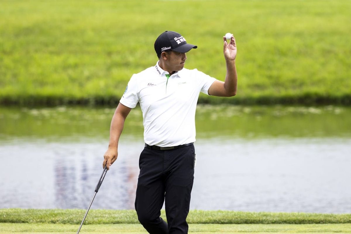 Jul 5, 2024; Silvis, Illinois, USA; C.T. Pan reacts after his putt on the 18th hole during the second round of the John Deere Classic golf tournament. Mandatory Credit: Joseph Cress-USA TODAY Sports
