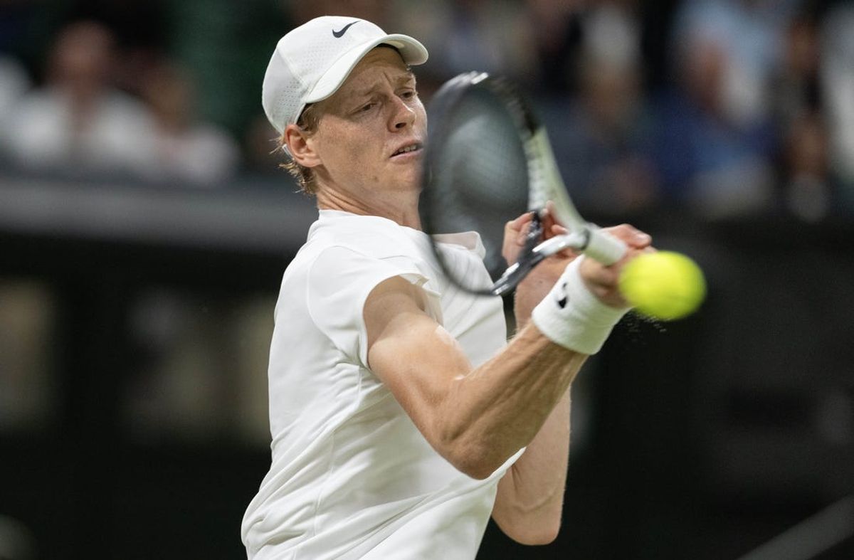 Jul 5, 2024; London, United Kingdom; Jannik Sinner of Italy returns a shot during his match against Miomir Kecmanovic of Serbia (not shown) on day five of The Championships at All England Lawn Tennis and Croquet Club. Mandatory Credit: Susan Mullane-USA TODAY Sports