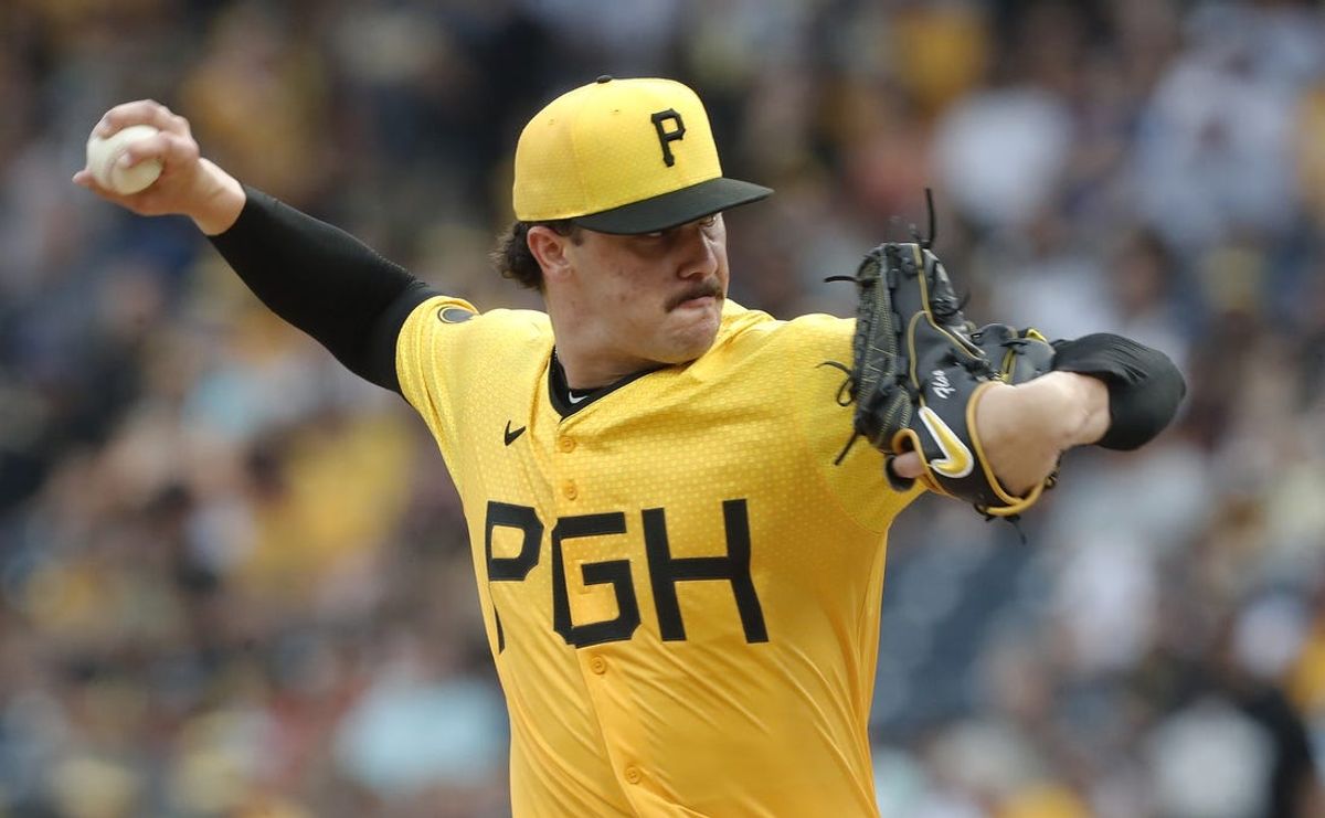 Jul 5, 2024; Pittsburgh, Pennsylvania, USA;  Pittsburgh Pirates starting pitcher Paul Skenes (30) delivers a pitch against the New York Mets during the first inning at PNC Park. Mandatory Credit: Charles LeClaire-USA TODAY Sports