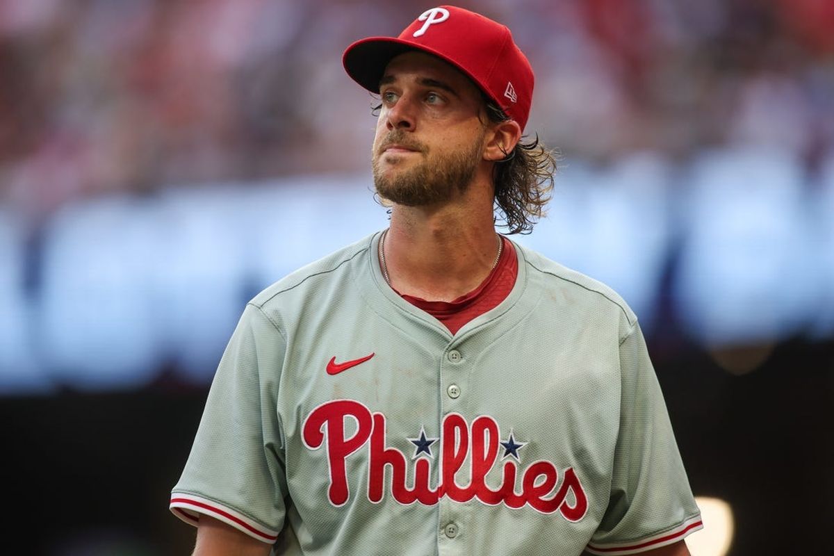 Jul 5, 2024; Atlanta, Georgia, USA; Philadelphia Phillies starting pitcher Aaron Nola (27) walks off the field against the Atlanta Braves in the second inning at Truist Park. Mandatory Credit: Brett Davis-USA TODAY Sports
