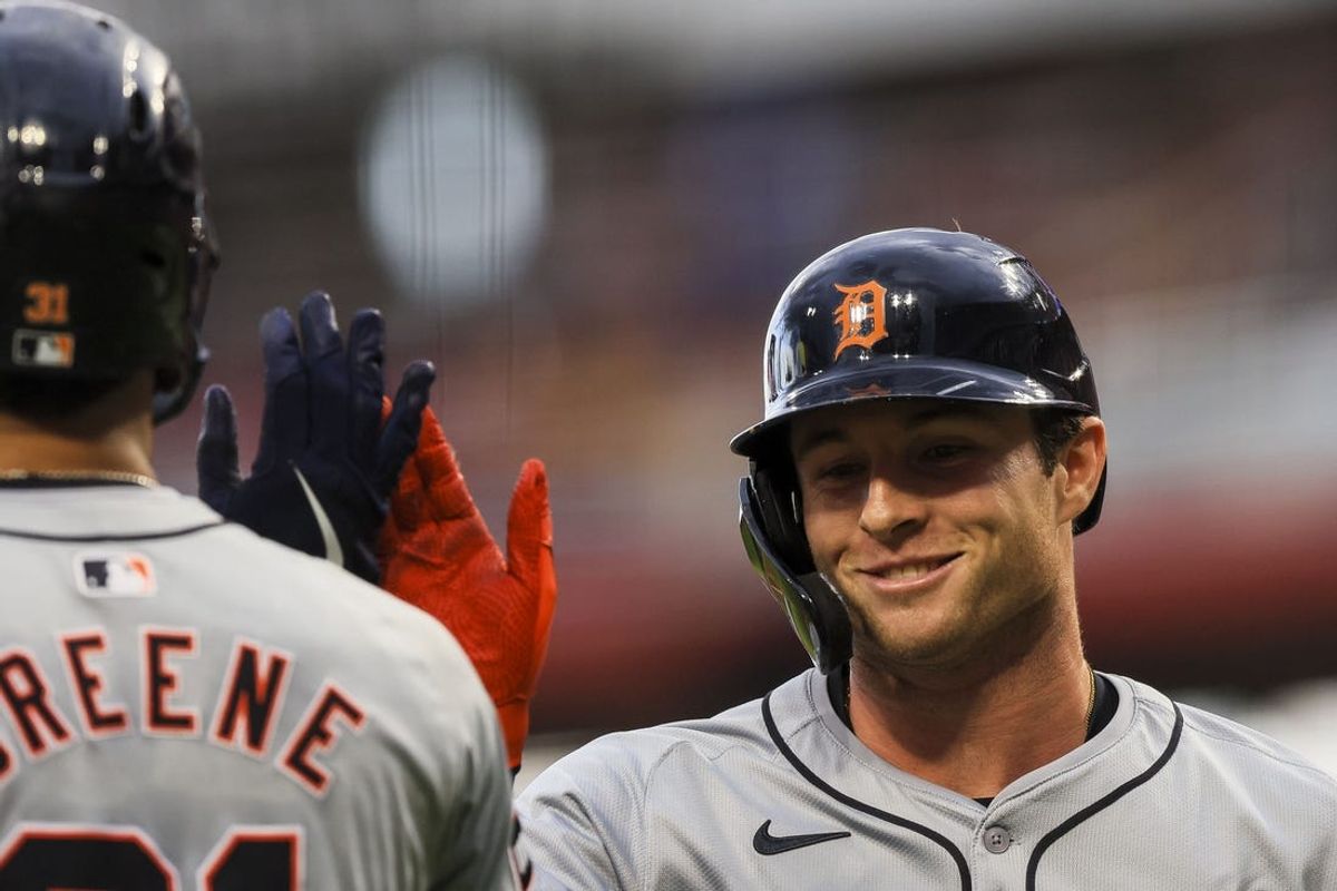 Jul 5, 2024; Cincinnati, Ohio, USA; Detroit Tigers second baseman Colt Keith (33) high fives outfielder Riley Greene (31) after hitting a solo home run in the third inning against the Cincinnati Reds at Great American Ball Park. Mandatory Credit: Katie Stratman-USA TODAY Sports