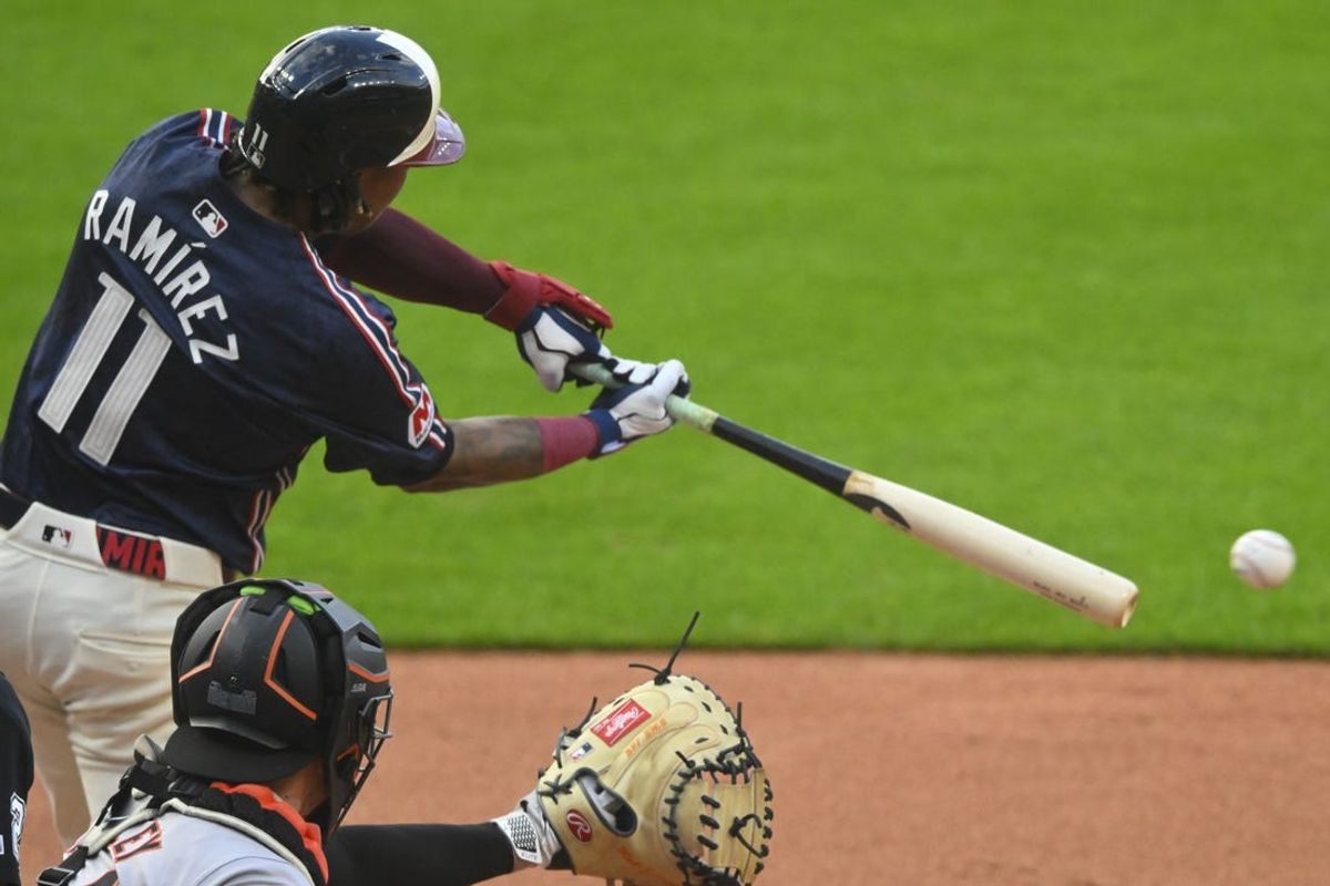 Jul 5, 2024; Cleveland, Ohio, USA; Cleveland Guardians third baseman Jose Ramirez (11) singles in the first inning against the San Francisco Giants at Progressive Field. Mandatory Credit: David Richard-USA TODAY Sports