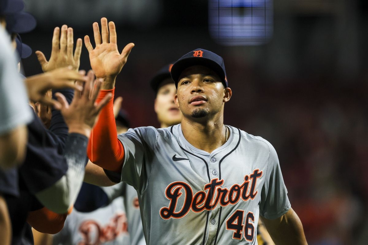 Jul 5, 2024; Cincinnati, Ohio, USA; Detroit Tigers outfielder Wenceel Perez (46) high fives teammates after the victory over the Cincinnati Reds at Great American Ball Park. Mandatory Credit: Katie Stratman-Imagn Images