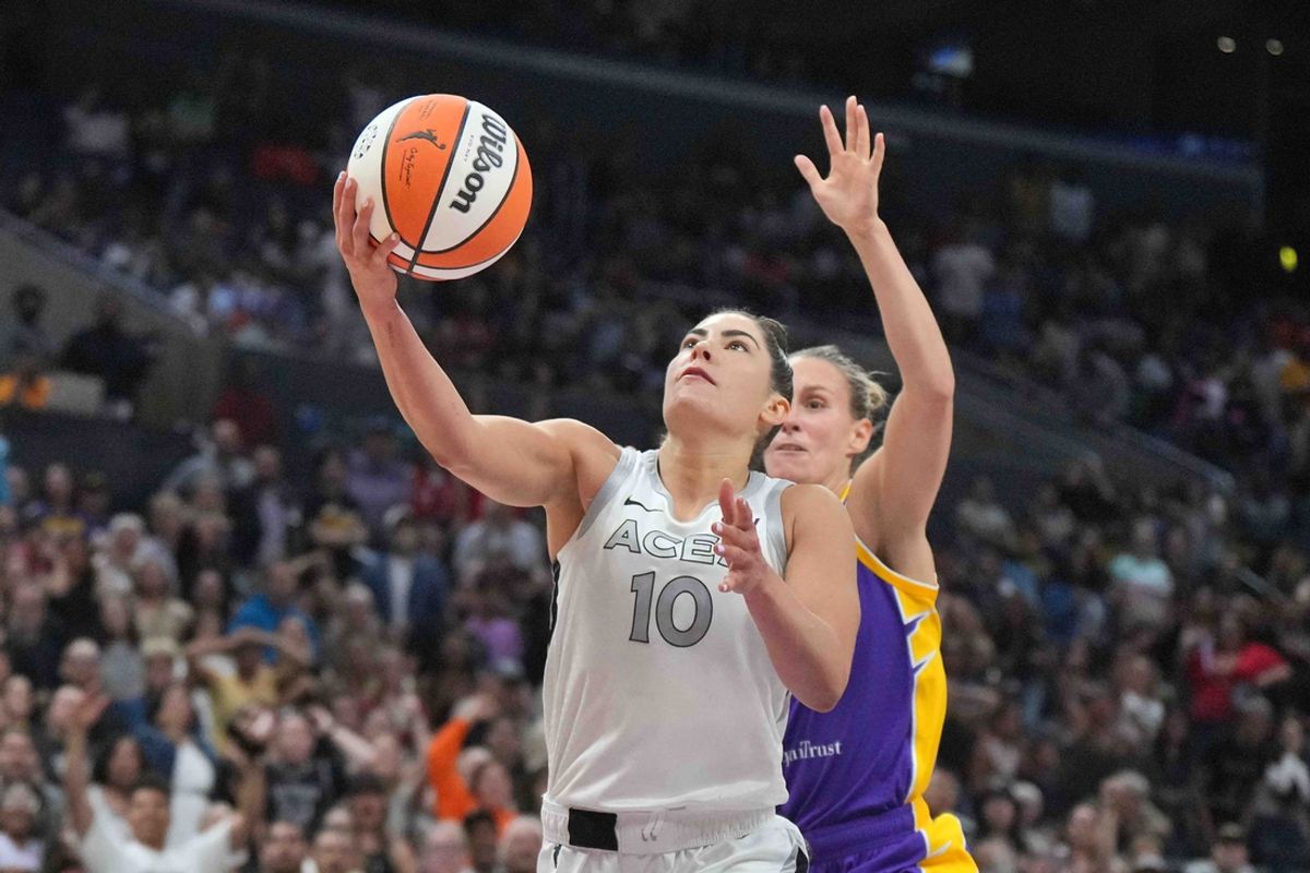 Jul 5, 2024; Los Angeles, California, USA; Las Vegas Aces guard Kelsey Plum (10) shoots the ball against LA Sparks forward Stephanie Talbot (7) in the second half at Crypto.com Arena. Mandatory Credit: Kirby Lee-Imagn Images