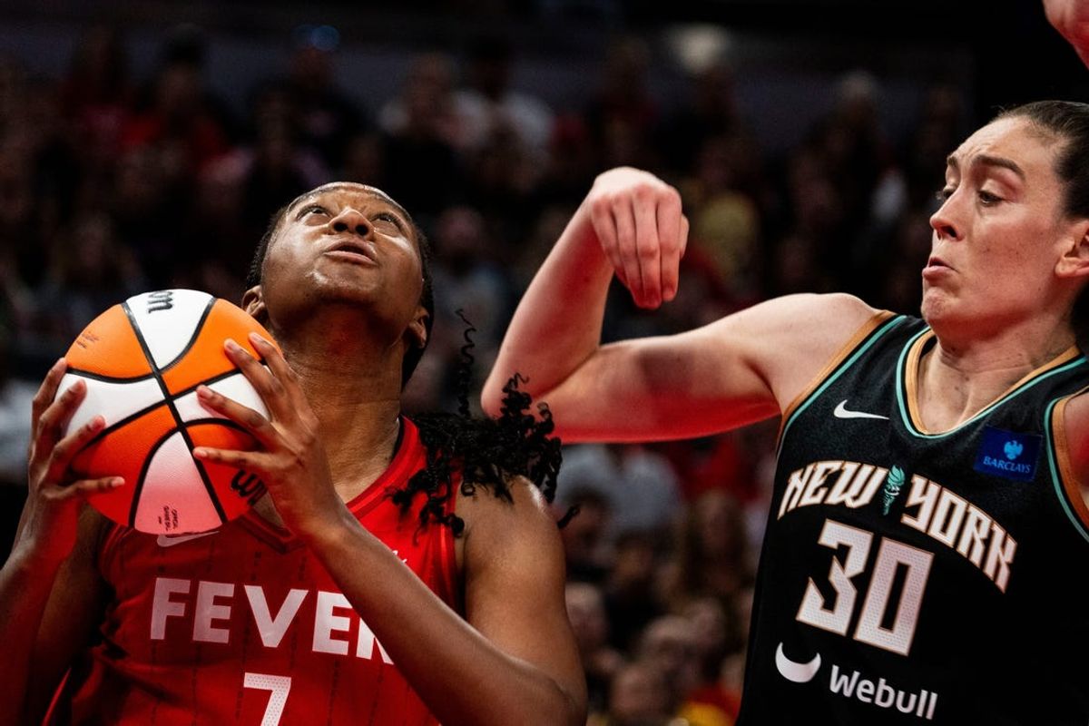 Indiana Fever forward Aliyah Boston (7) goes up for a layup against New York Liberty forward Breanna Stewart (30) on Saturday, July 6, 2024, during the game at Gainbridge Fieldhouse in Indianapolis.