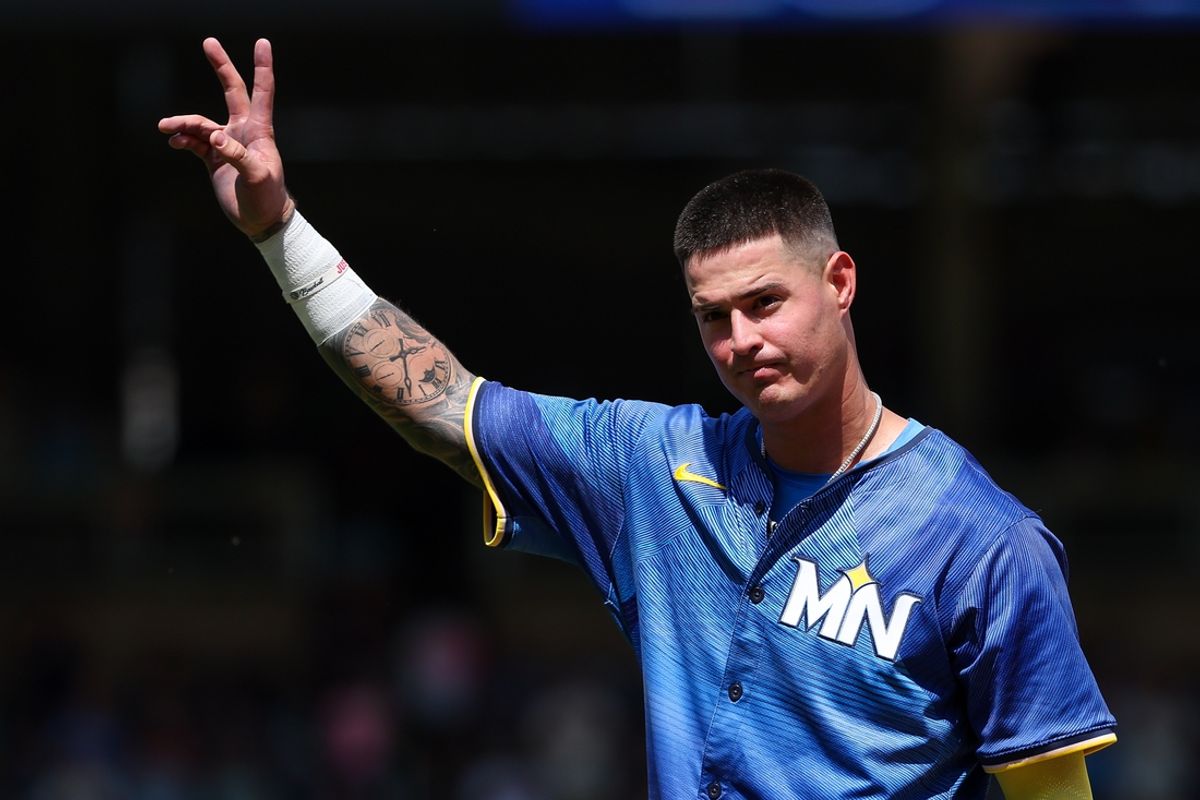 Jul 6, 2024; Minneapolis, Minnesota, USA; Minnesota Twins third baseman Jose Miranda (64) acknowledges the crowd after his streak of 12 consecutive at-bats with a hit comes to an end during the sixth inning against the Houston Astros at Target Field. Mandatory Credit: Matt Krohn-USA TODAY Sports