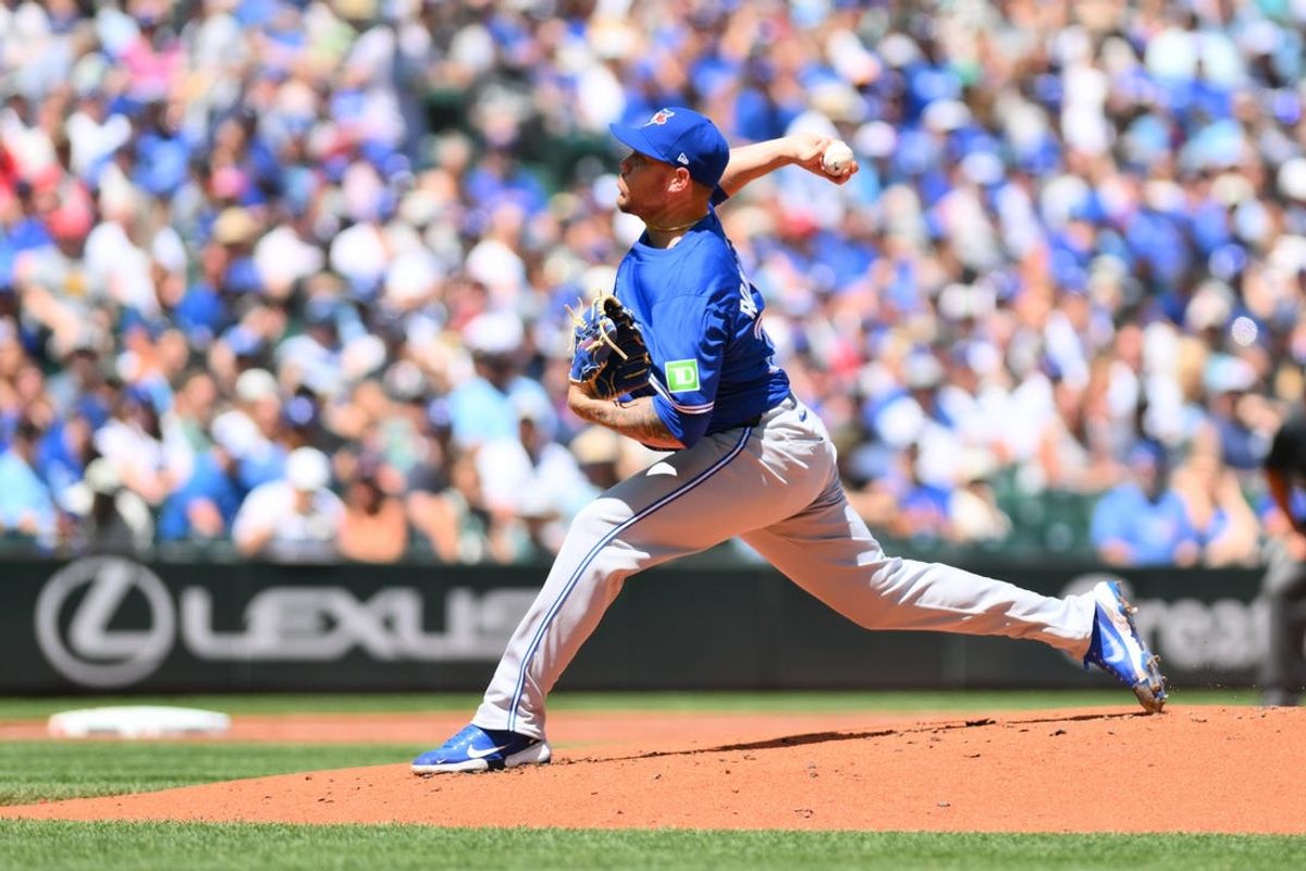 Jul 6, 2024; Seattle, Washington, USA; Toronto Blue Jays starting pitcher Yariel Rodriguez (29) pitches to the Seattle Mariners during the first inning at T-Mobile Park. Mandatory Credit: Steven Bisig-USA TODAY Sports