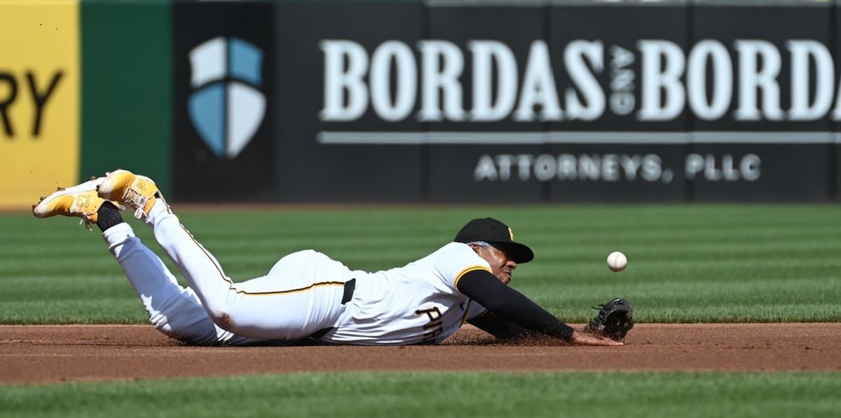 Jul 6, 2024; Pittsburgh, Pennsylvania, USA;  Pittsburgh Pirates third baseman Ke’Bryan Hayes (13) dives for the ball during the first-inning against the New York Mets at PNC Park. Mandatory Credit: Philip G. Pavely-USA TODAY Sports