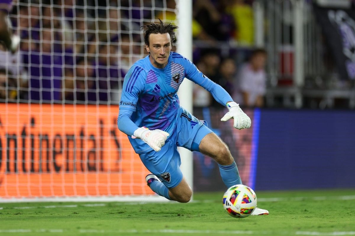 Jul 6, 2024; Orlando, Florida, USA;  D.C. United goalkeeper Tyler Miller (1) makes a save against Orlando City in the second half at Inter&Co Stadium. Mandatory Credit: Nathan Ray Seebeck-Imagn Images