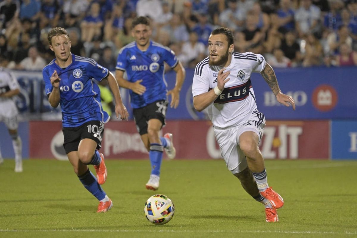 Jul 6, 2024; Montreal, Quebec, CAN; Vancouver Whitecaps FC forward Nicolas Fleuriau Chateau (52) controls the ball against CF Montreal during the second half  at Stade Saputo. Mandatory Credit: Eric Bolte-USA TODAY Sports