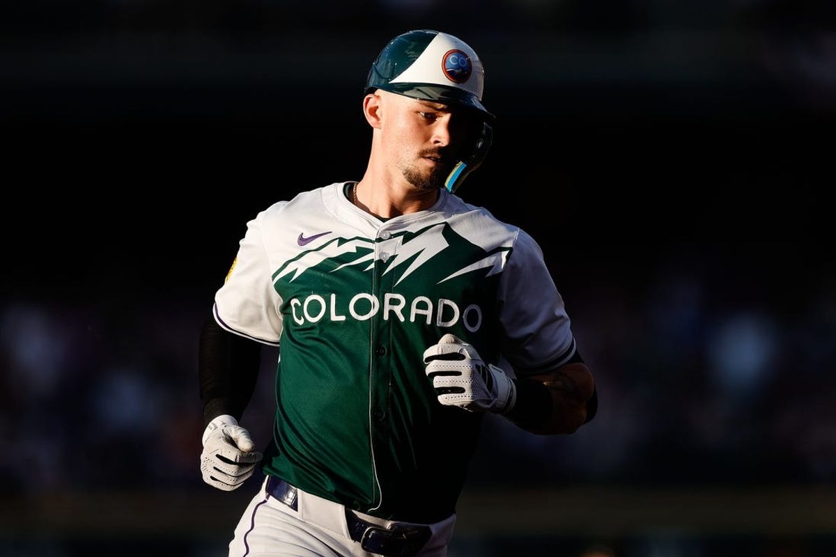 Jul 6, 2024; Denver, Colorado, USA; Colorado Rockies center fielder Brenton Doyle (9) rounds the bases on a two run home run in the second inning against the Kansas City Royals at Coors Field. Mandatory Credit: Isaiah J. Downing-USA TODAY Sports