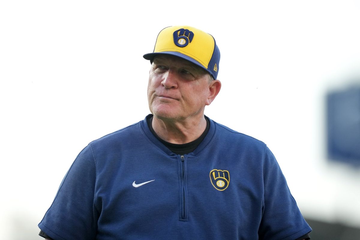 Jul 6, 2024; Los Angeles, California, USA; Milwaukee Brewers manager Pat Murphy (21) reacts during the game against the Los Angeles Dodgers at Dodger Stadium. Mandatory Credit: Kirby Lee-USA TODAY Sports