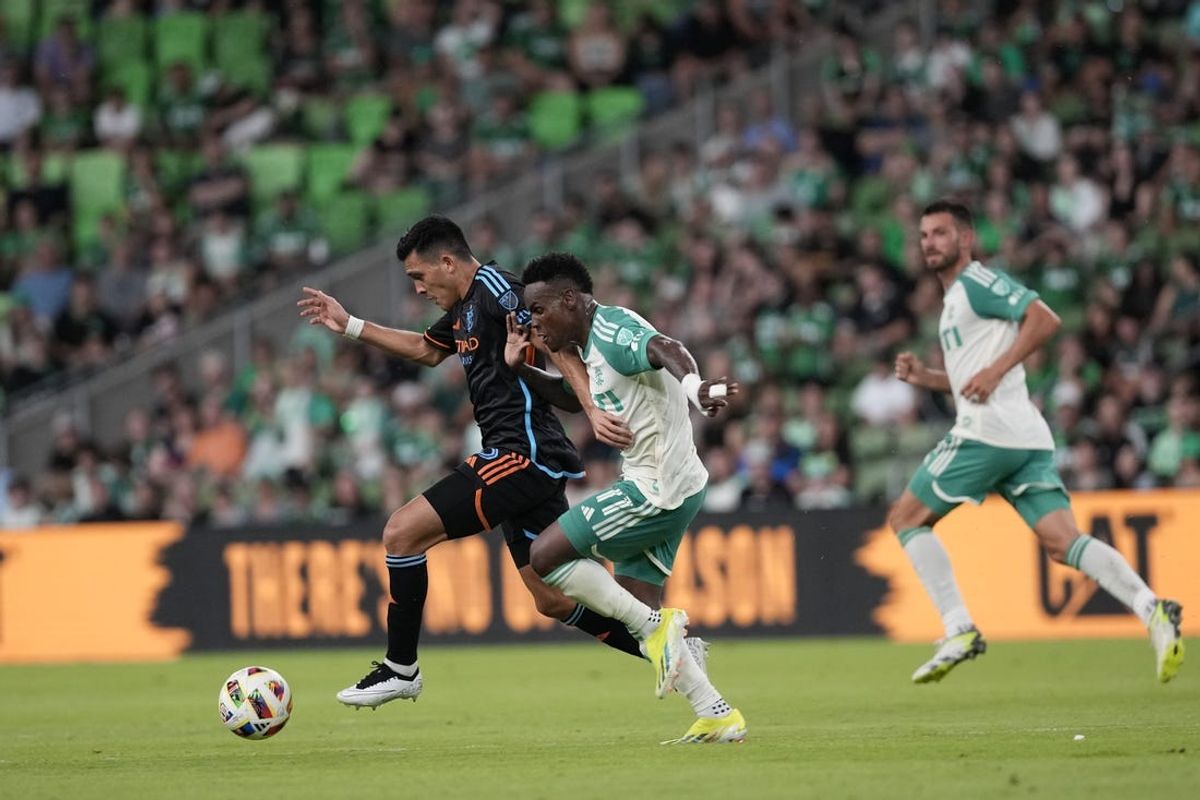 Jul 6, 2024; Austin, Texas, USA; New York City FC forward Alonso Martinez (16) and Austin FC forward Jader Obrian (11) battle for the ball during the second half at Q2 Stadium. Mandatory Credit: Scott Wachter-USA TODAY Sports