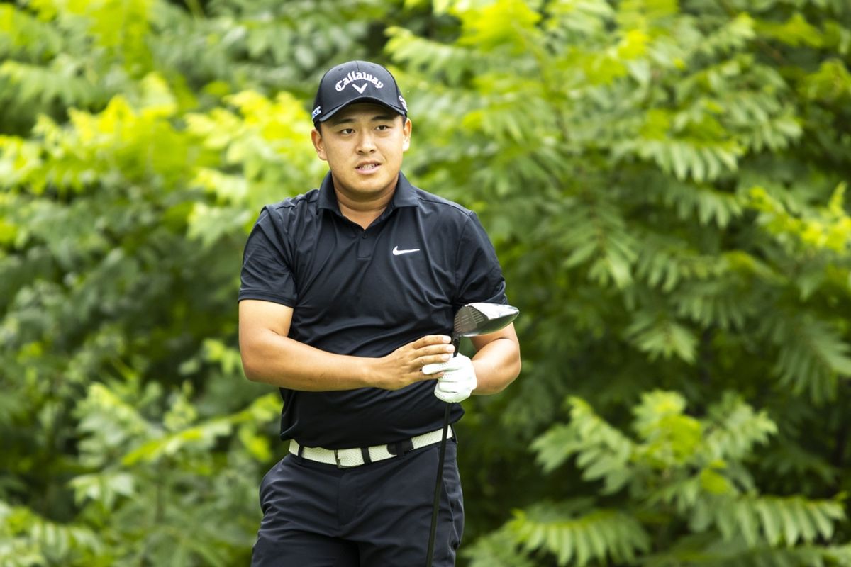 Jul 7, 2024; Silvis, Illinois, USA; Kevin Yu reacts after hitting his tee shot on the second hole during the final round of the John Deere Classic golf tournament. Mandatory Credit: Joseph Cress-Imagn Images