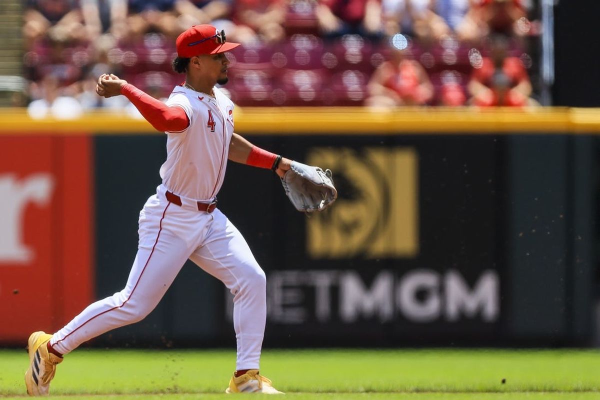Jul 7, 2024; Cincinnati, Ohio, USA; Cincinnati Reds second baseman Santiago Espinal (4) throws to first to get Detroit Tigers outfielder Wenceel Perez (not pictured) out in the first inning at Great American Ball Park. Mandatory Credit: Katie Stratman-USA TODAY Sports