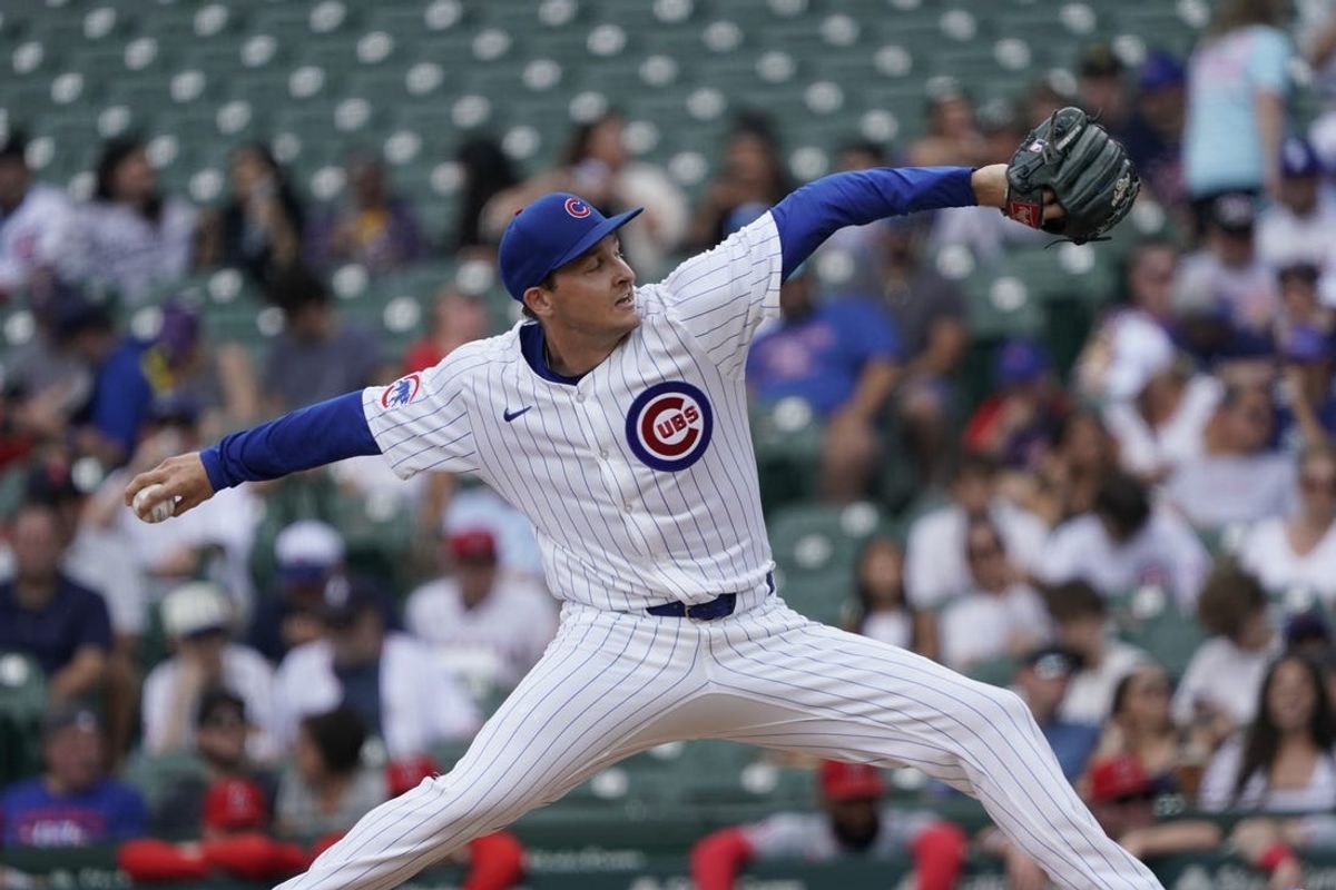 Jul 7, 2024; Chicago, Illinois, USA; Chicago Cubs pitcher Hayden Wesneski (19) throws the ball against the Los Angeles Angels during the first inning at Wrigley Field. Mandatory Credit: David Banks-USA TODAY Sports