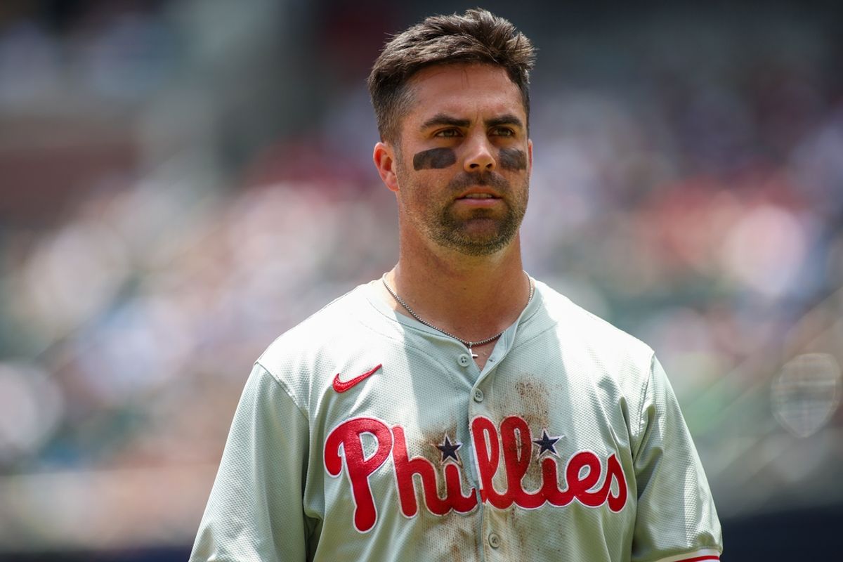 Jul 7, 2024; Atlanta, Georgia, USA; Philadelphia Phillies left fielder Whit Merrifield (9) after an inning against the Atlanta Braves in the second inning at Truist Park. Mandatory Credit: Brett Davis-USA TODAY Sports
