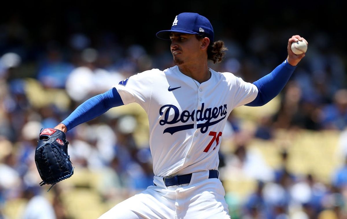 Jul 7, 2024; Los Angeles, California, USA; Los Angeles Dodgers pitcher Justin Wrobleski (70) throws in his major league debut during the first inning against the Milwaukee Brewers at Dodger Stadium. Mandatory Credit: Jason Parkhurst-USA TODAY Sports