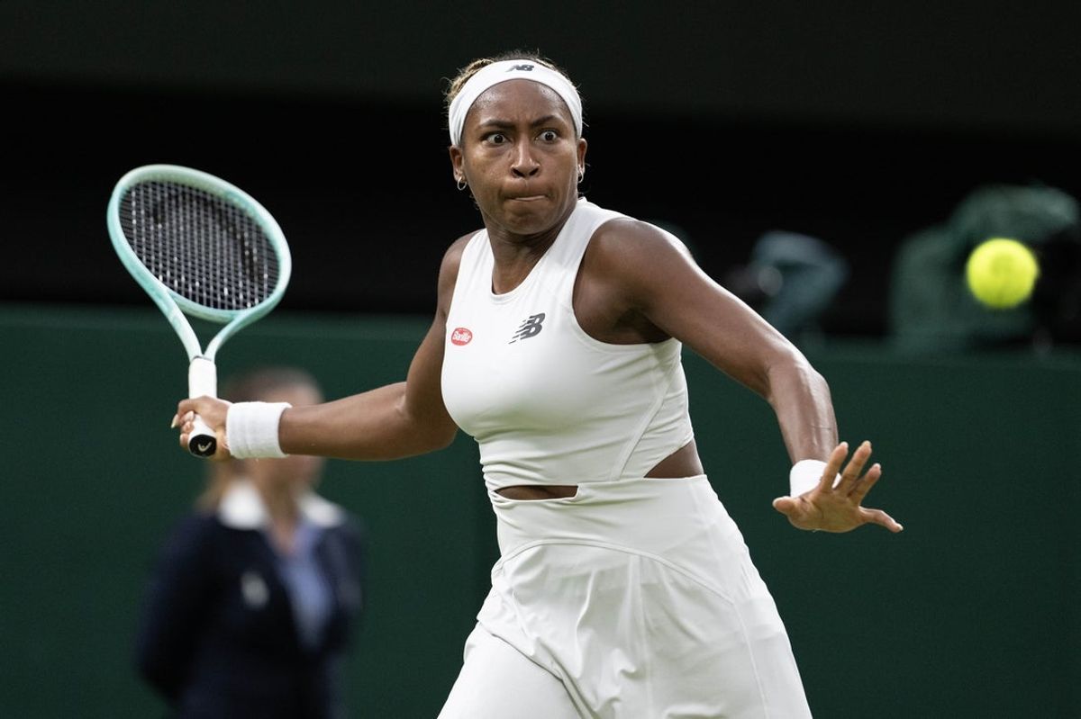 Jul 7, 2024; London,United Kingdom; Coco Gauff of the United States returns a shot during her match against Emma Navarro of the United States (not shown) on day seven of The Championships at All England Lawn Tennis and Croquet Club. Mandatory Credit: Susan Mullane-Imagn Images