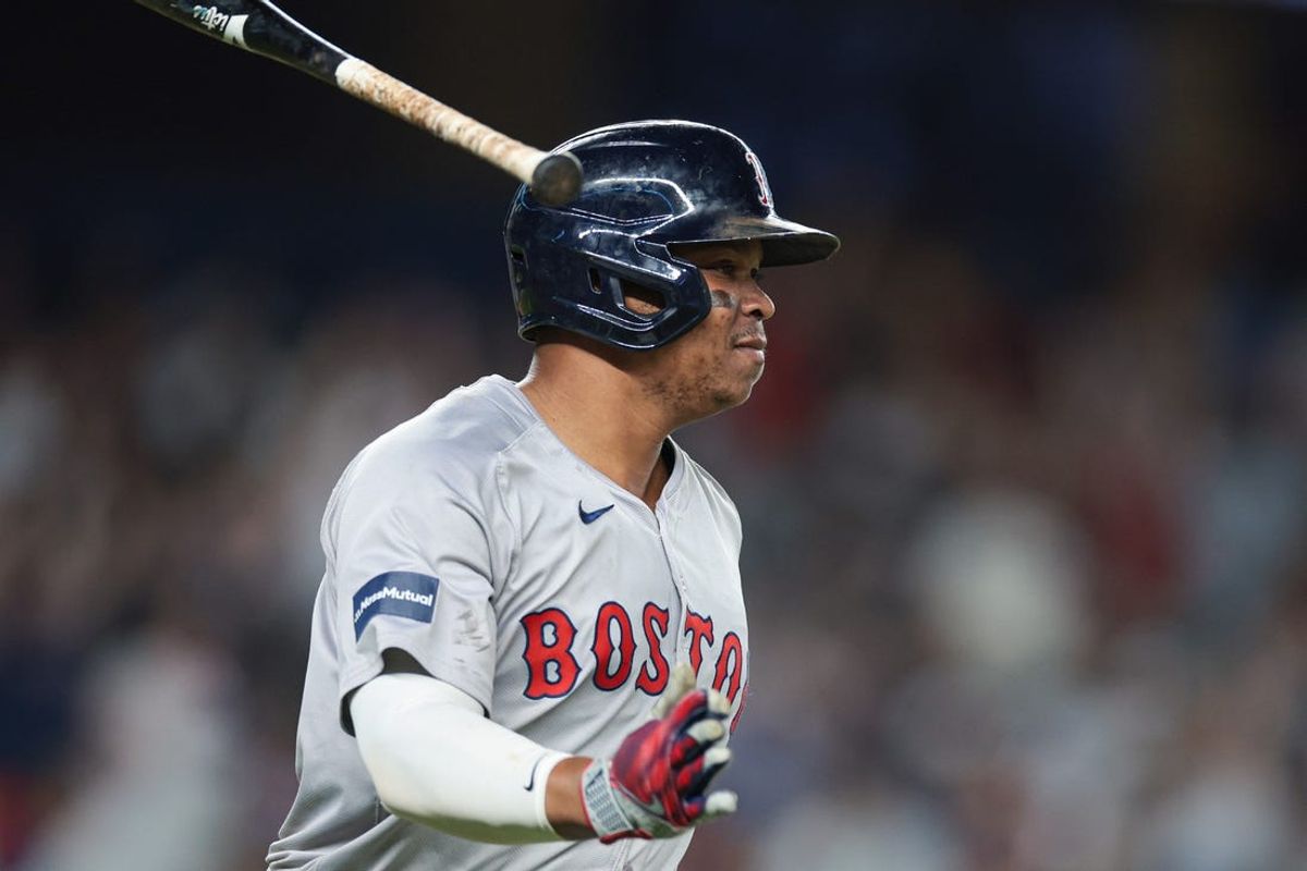 Jul 7, 2024; Bronx, New York, USA; Boston Red Sox third baseman Rafael Devers (11) reacts after his solo home run during the ninth inning against the New York Yankees at Yankee Stadium. Mandatory Credit: Vincent Carchietta-USA TODAY Sports