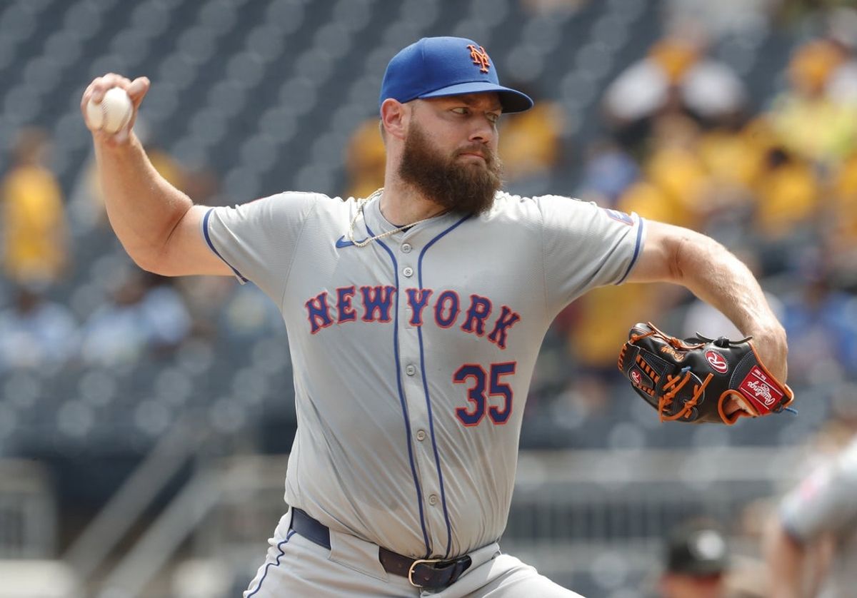 Jul 8, 2024; Pittsburgh, Pennsylvania, USA;  New York Mets relief pitcher Adrian Houser (35) throws against the Pittsburgh Pirates during the eighth inning at PNC Park. The Pirates won 8-2.  Mandatory Credit: Charles LeClaire-Imagn Images