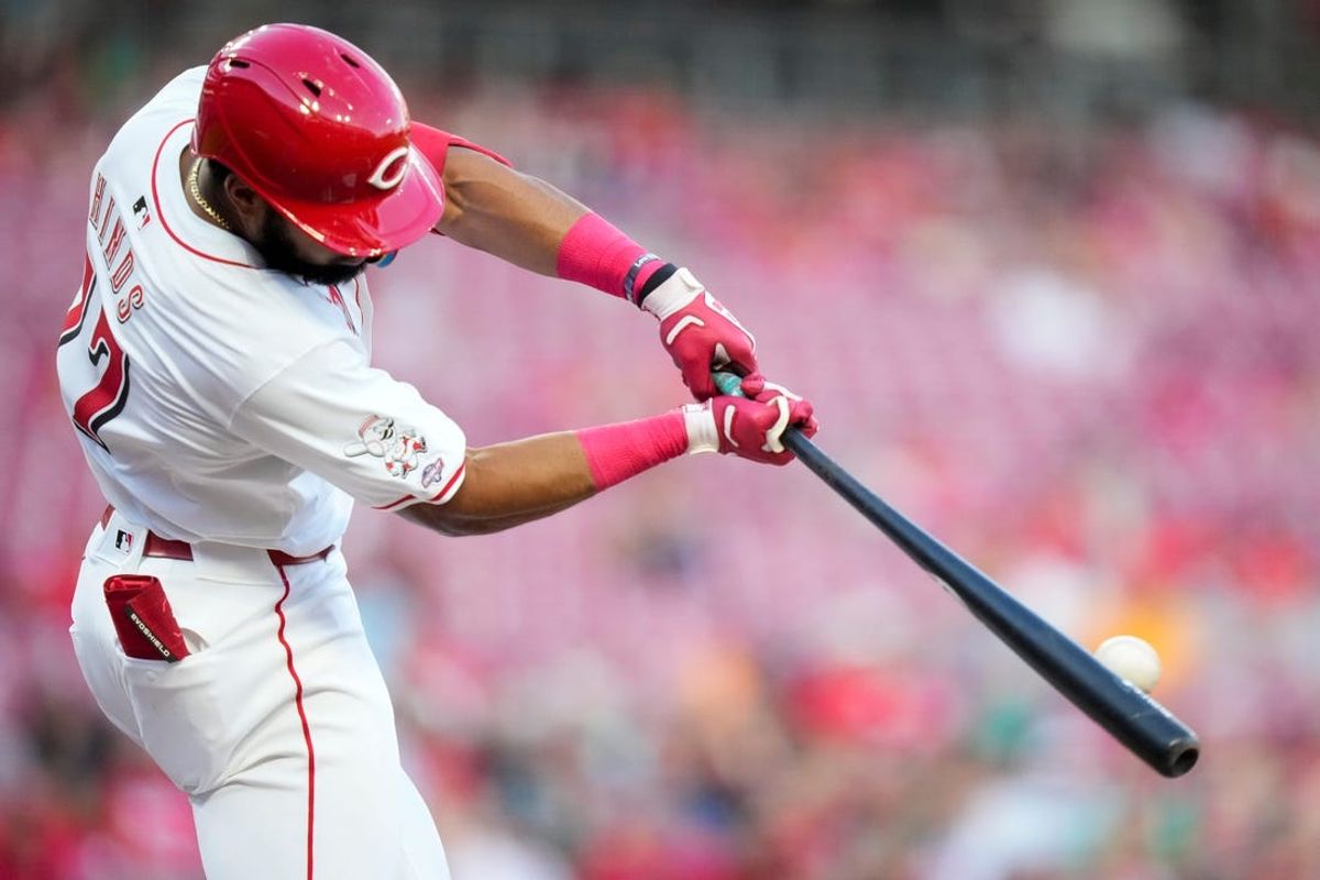 Cincinnati Reds right fielder Rece Hinds (77) grounds out in his MLB debut at bat in the bottom of the third inning of the MLB National League game between the Cincinnati Reds and the Colorado Rockies at Great American Ball Park in downtown Cincinnati on Monday, July 8, 2024. The score was 0-0 after three innings.