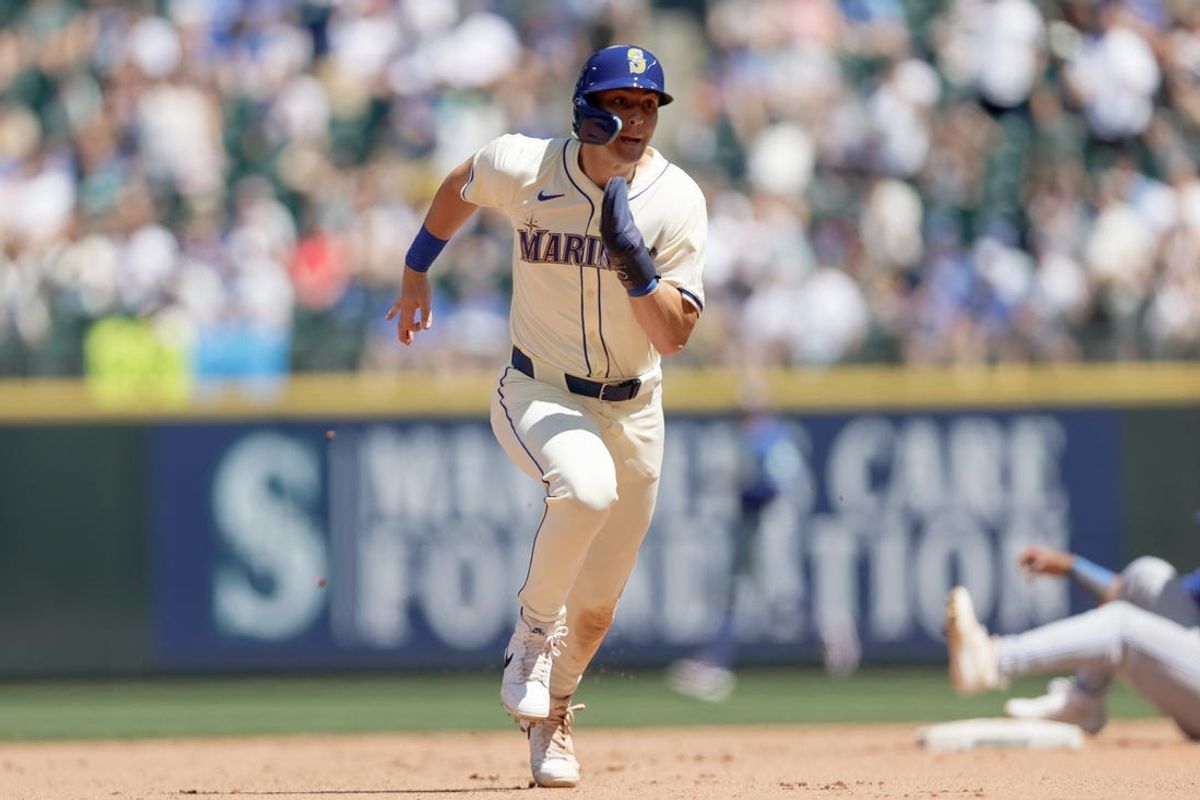 Jul 7, 2024; Seattle, Washington, USA; Seattle Mariners right fielder Dominic Canzone (8) advances to third during the fifth inning against the Toronto Blue Jays at T-Mobile Park. Mandatory Credit: John Froschauer-USA TODAY Sports