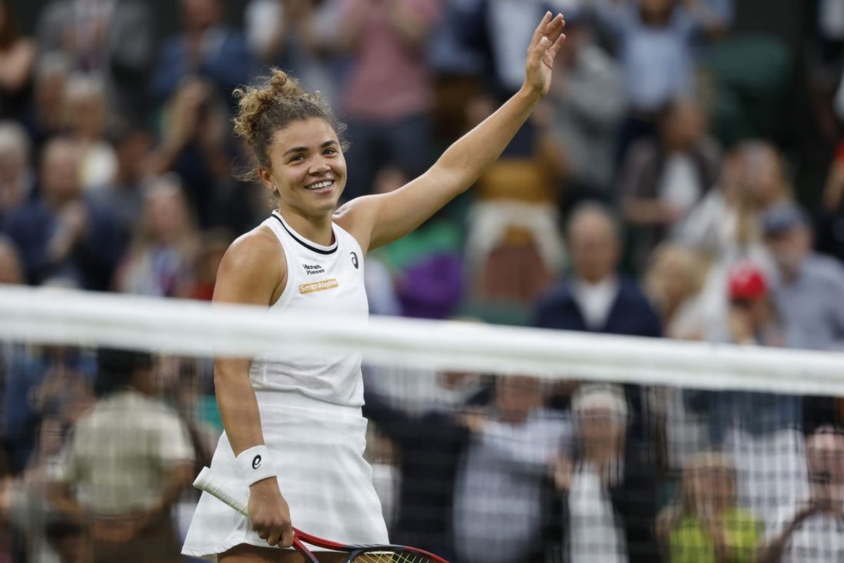 Jul 9, 2024; London, United Kingdom; Jasmine Paolini (ITA) waves tho the crowd after her match against Emma Navarro (USA)(not pictured) in a ladies' singles quarter final match on day nine of The Championships Wimbledon 2024 at The All England Lawn Tennis Club. Mandatory Credit: Geoff Burke-USA TODAY Sports