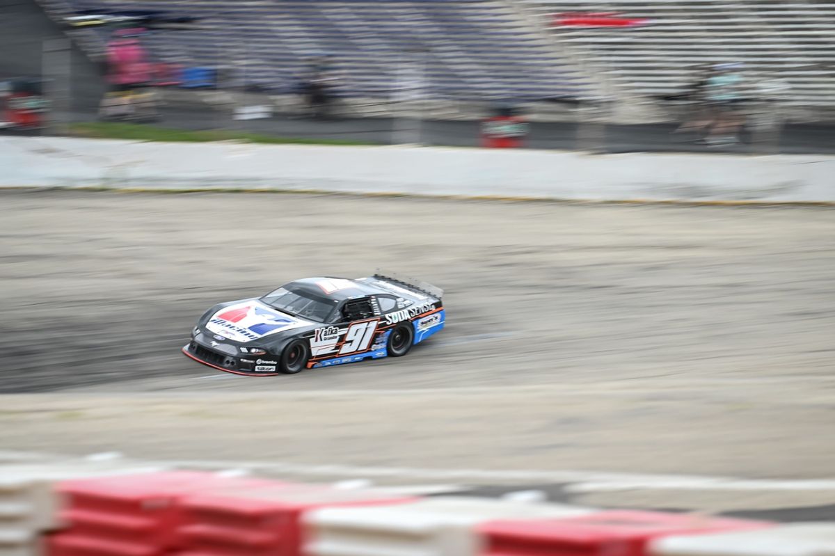 Ty Majeski (91) drives into Turn 1 during practice at the Slinger Nationals on Tuesday, July 9, 2024, at the Slinger Speedway in Slinger, Wisconsin.