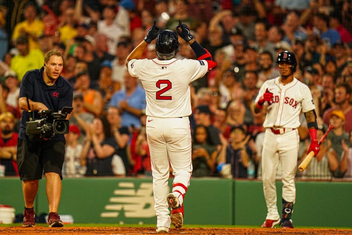 Jul 9, 2024; Boston, Massachusetts, USA; Boston Red Sox first baseman Dominic Smith (2) hits a home run against the Oakland Athletics in the second inning at Fenway Park. Mandatory Credit: David Butler II-USA TODAY Sports
