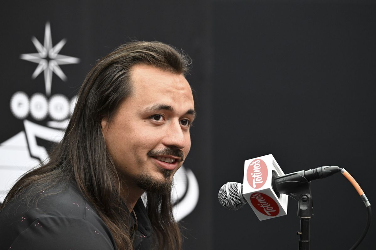 Jul 9, 2024; Las Vegas, NV, USA; Utah quarterback Cameron Rising speaks to the media during the Big 12 Media Days at Allegiant Stadium. Mandatory Credit: Candice Ward-USA TODAY Sports