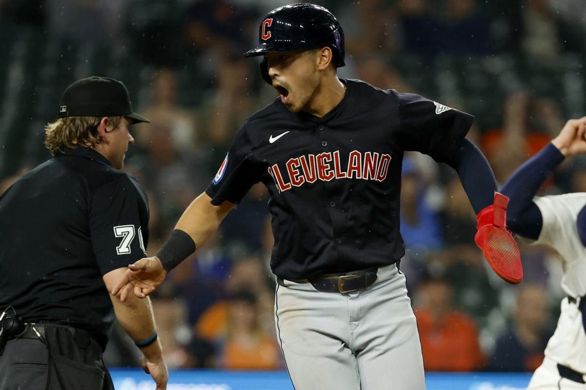 Jul 9, 2024; Detroit, Michigan, USA;  Cleveland Guardians outfielder Steven Kwan (38) celebrates after scoring in 10th inning at Comerica Park. Mandatory Credit: Rick Osentoski-USA TODAY Sports